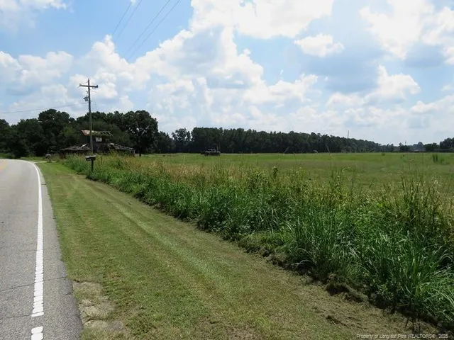 a view of a lake with a big yard