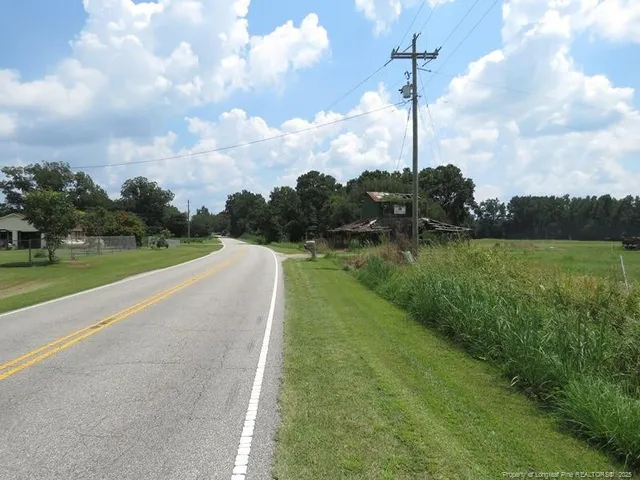 a view of a golf course with a lake