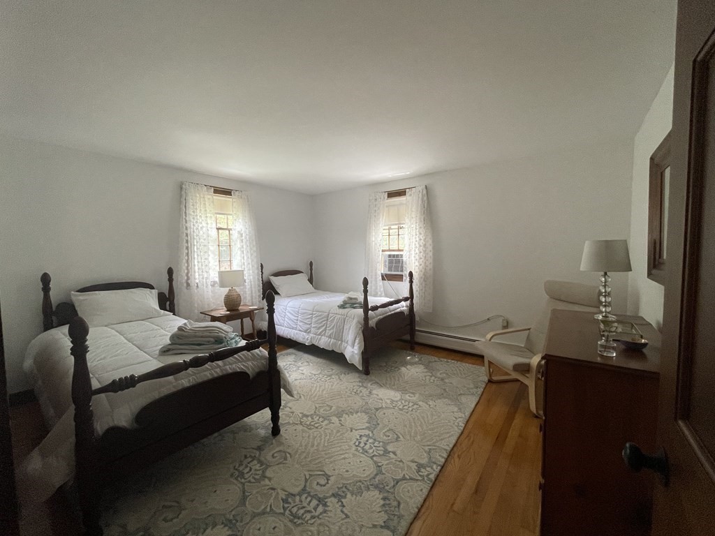 12 Seavers Road Orleans, MA 02653 - Photo 11 of 18 a bedroom with a bed and a window