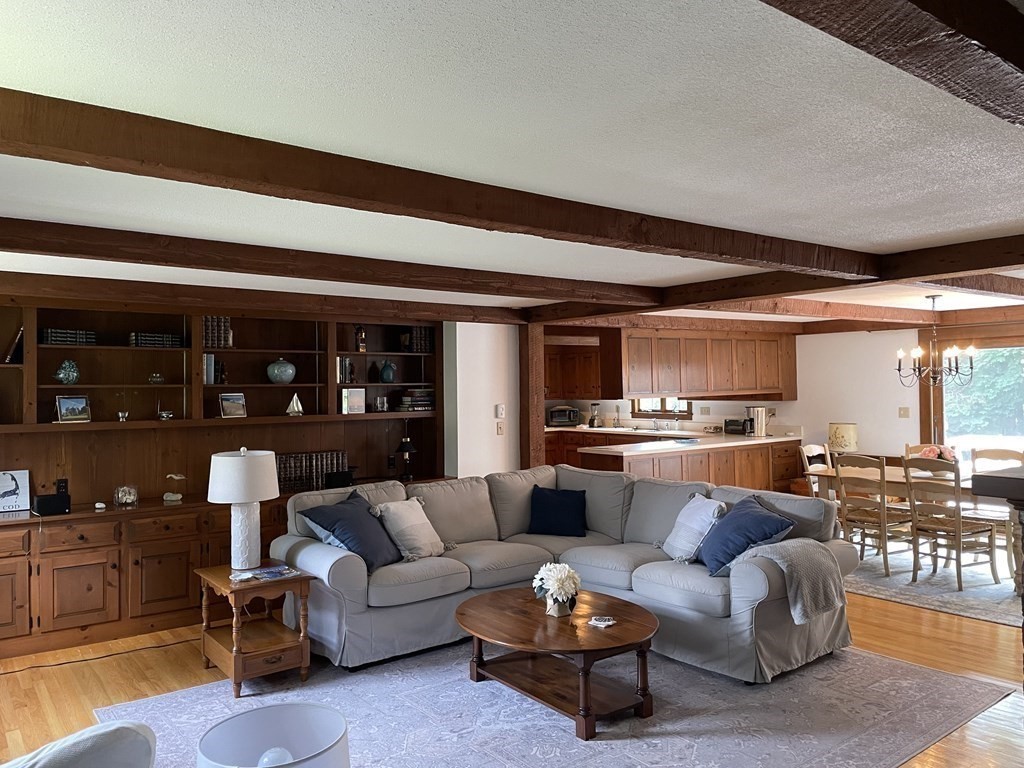 12 Seavers Road Orleans, MA 02653 - Photo 4 of 18 a living room with furniture and kitchen view