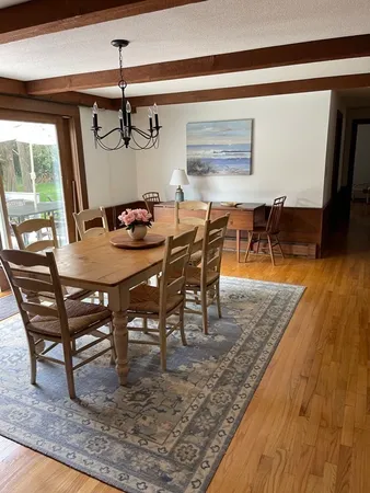 a view of a dining room with furniture