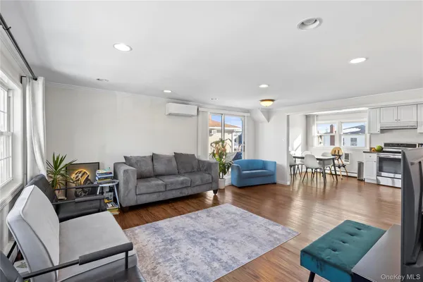 a living room with furniture and a table
