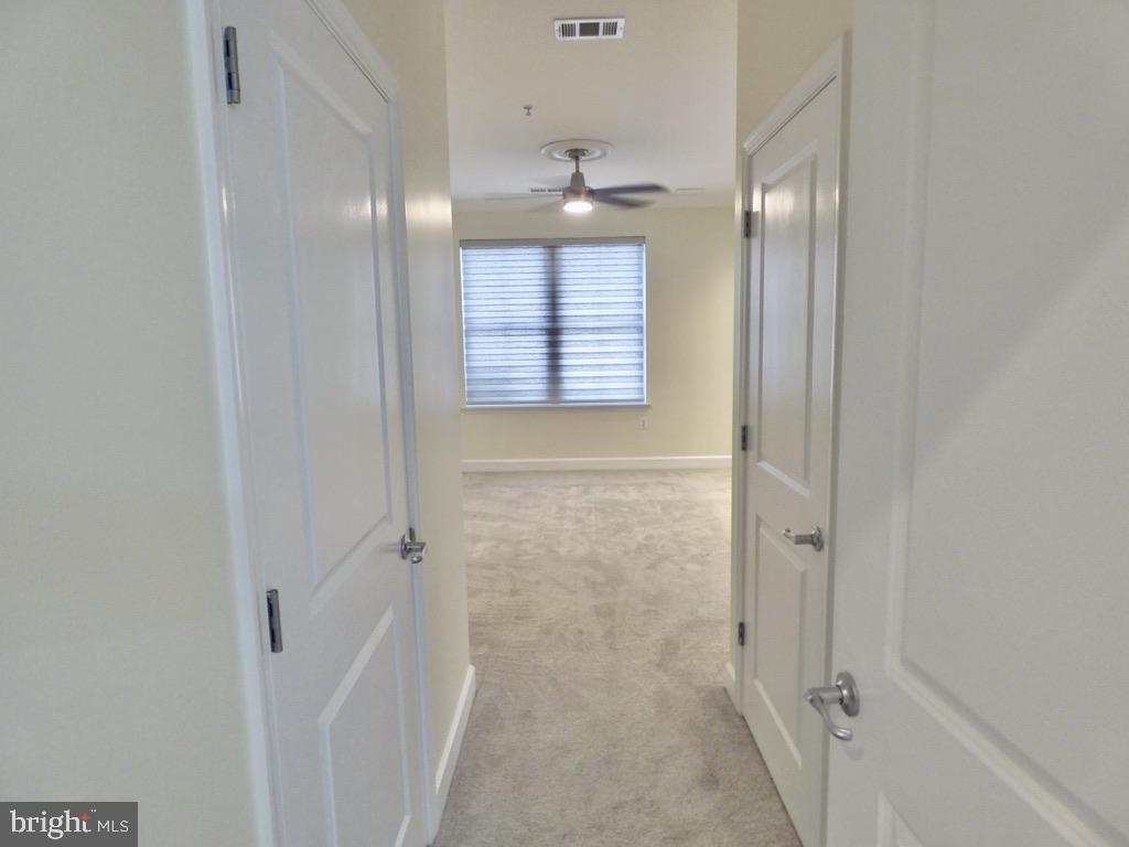 11800 Sunset Hills Road, Unit 118 Reston, VA 20190 - Photo 19 of 52 Bright and inviting hallway retreat.