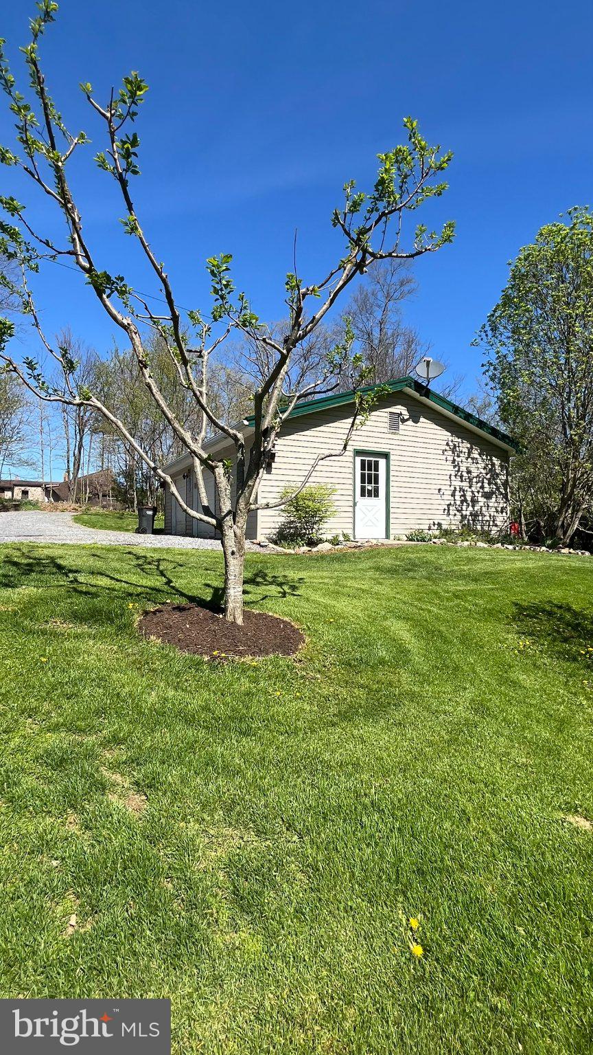 2290 Purdue Mountain Road Bellefonte, PA 16823 - Photo 18 of 48 Charming home with lush green lawn.