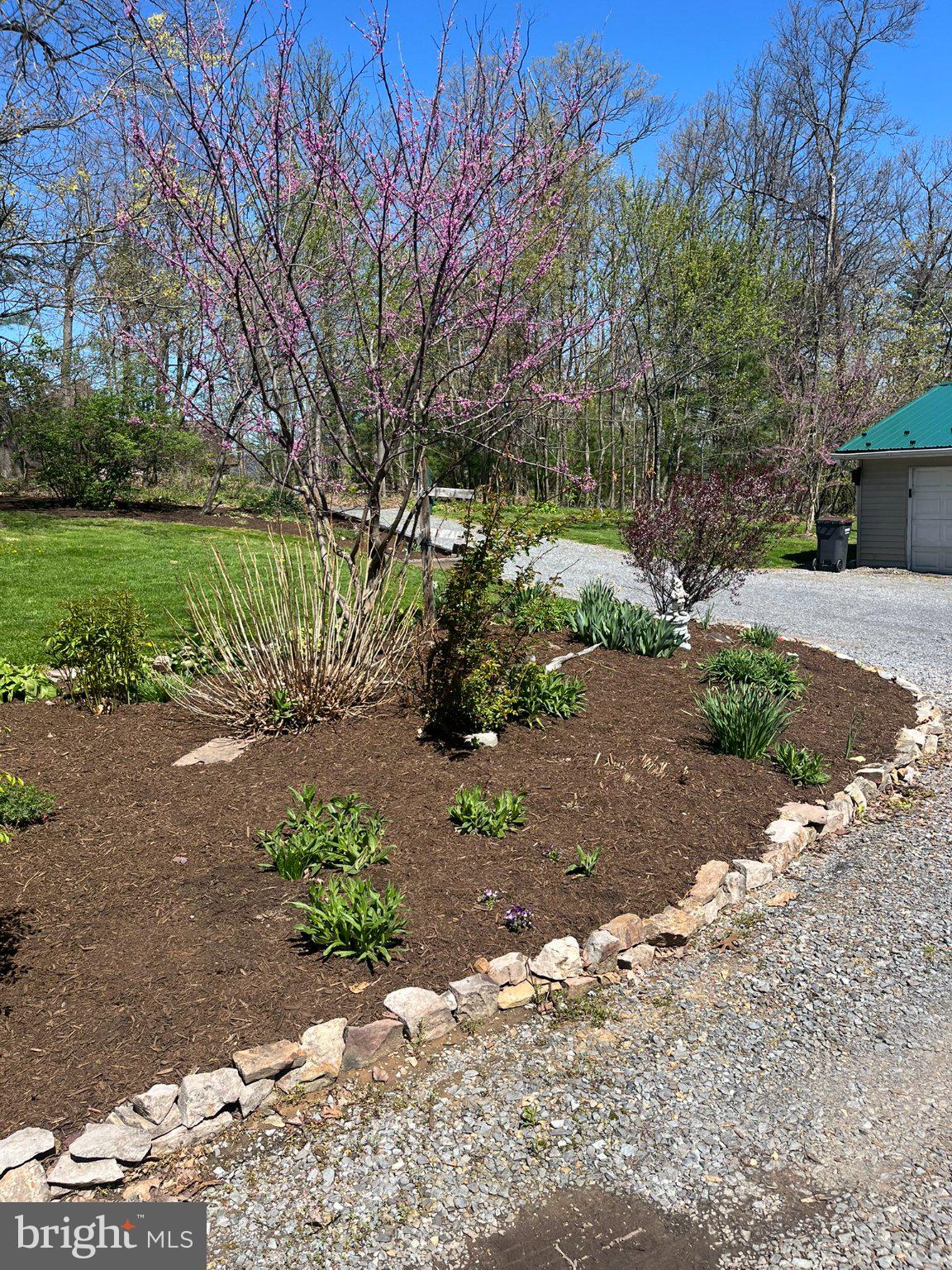 2290 Purdue Mountain Road Bellefonte, PA 16823 - Photo 33 of 48 Vibrant garden blooms in springtime.