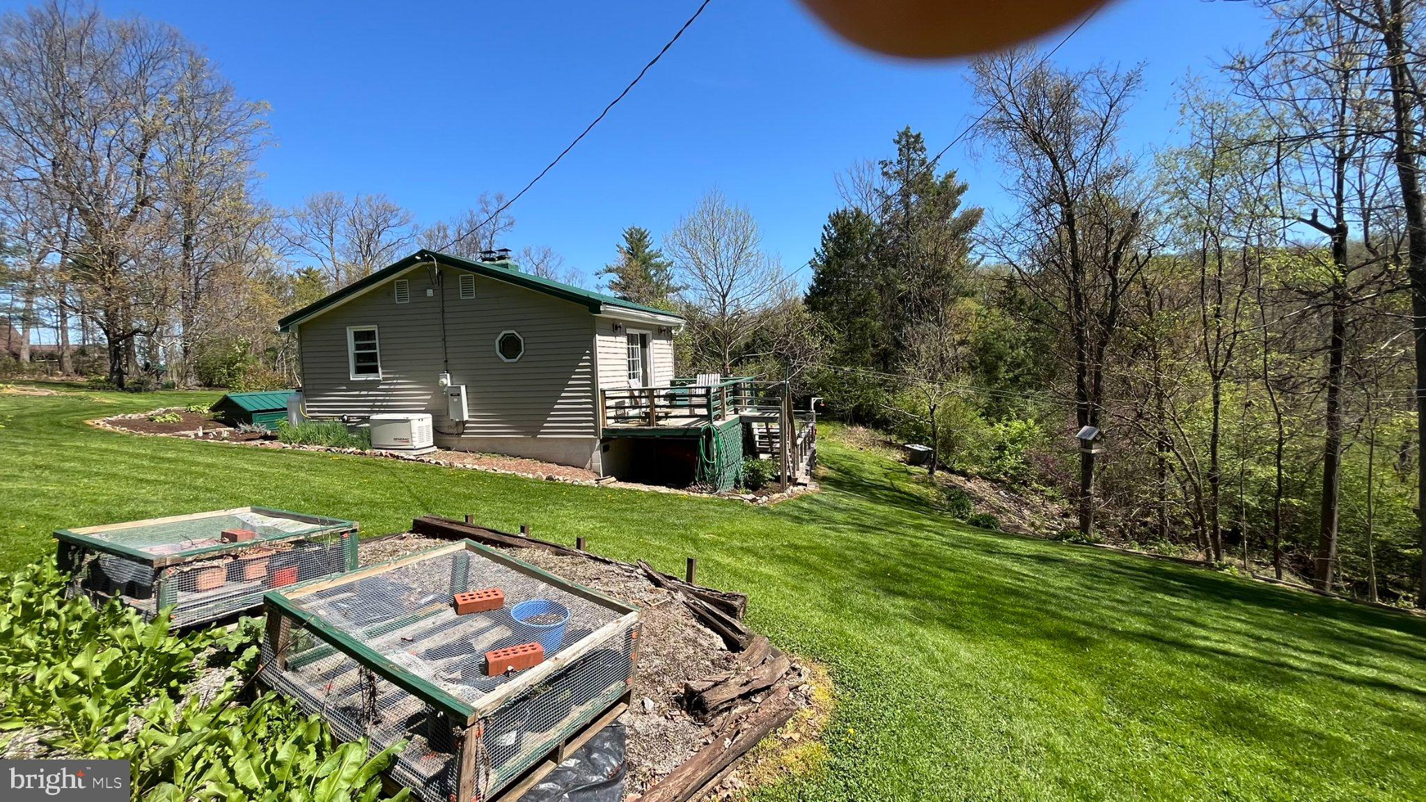 2290 Purdue Mountain Road Bellefonte, PA 16823 - Photo 35 of 48 Charming home nestled in lush greenery.