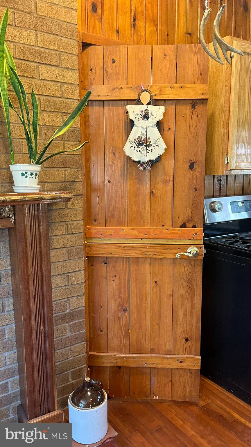2290 Purdue Mountain Road Bellefonte, PA 16823 - Photo 6 of 48 Charming wooden door with rustic flair.