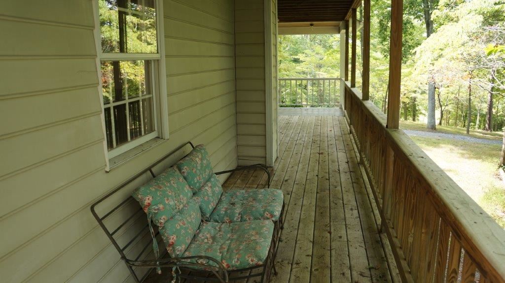 286 Beazley Road Ruckersville, VA 22968 - Photo 13 of 50 a view of balcony with wooden floor