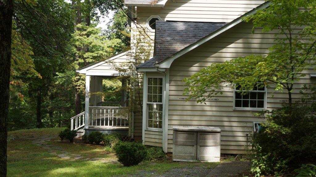 286 Beazley Road Ruckersville, VA 22968 - Photo 16 of 50 a balcony with trees in front of it