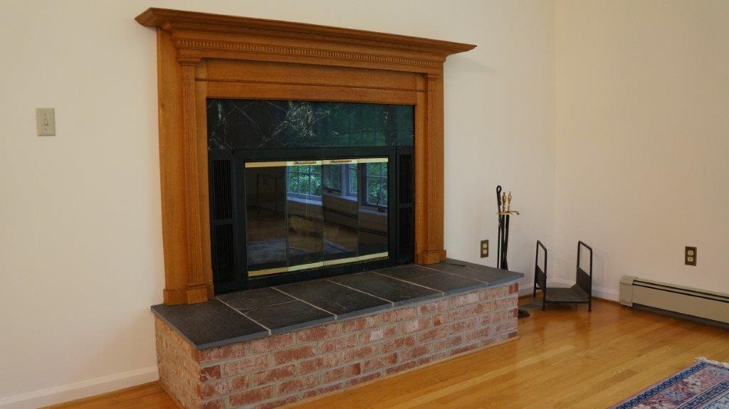 286 Beazley Road Ruckersville, VA 22968 - Photo 20 of 50 a living room with a fireplace