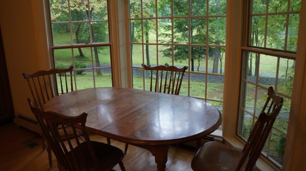 286 Beazley Road Ruckersville, VA 22968 - Photo 28 of 50 a view of a dining room with furniture window and outside view
