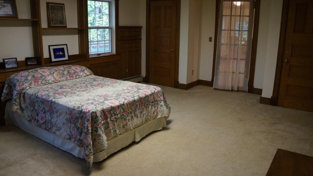 286 Beazley Road Ruckersville, VA 22968 - Photo 32 of 50 a bed sitting in a spacious bedroom next to a window