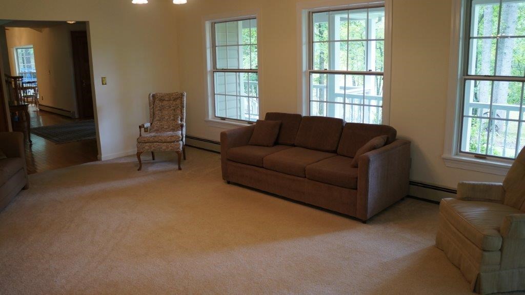 286 Beazley Road Ruckersville, VA 22968 - Photo 38 of 50 a living room with furniture and a window