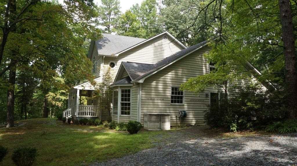 286 Beazley Road Ruckersville, VA 22968 - Photo 4 of 50 a view of a small house with a yard