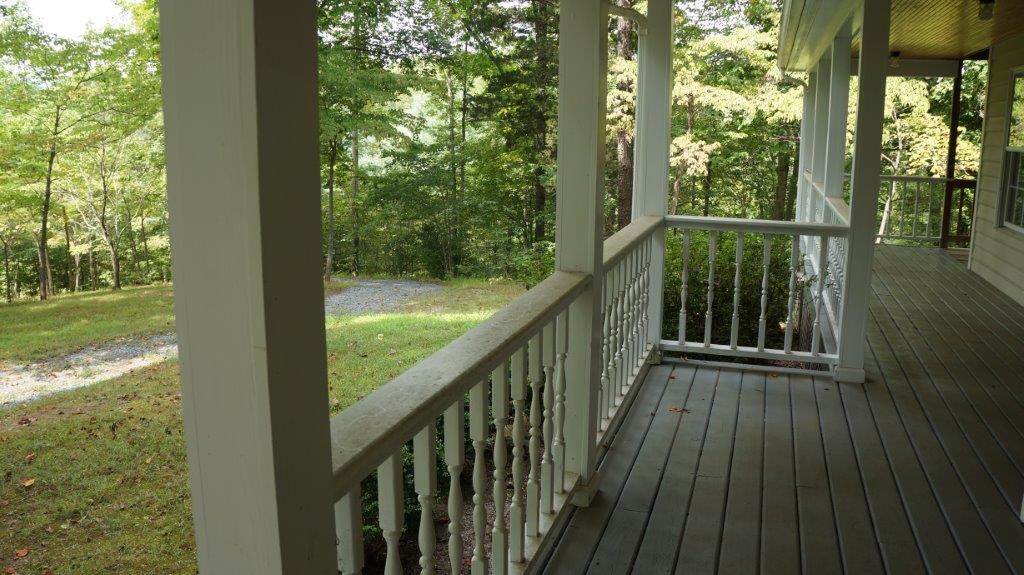 286 Beazley Road Ruckersville, VA 22968 - Photo 6 of 50 a view of a balcony with wooden floor