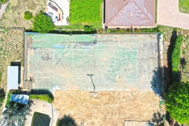 a view of a swimming pool with a patio