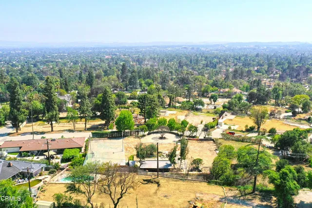 a view of a yard with an outdoor space