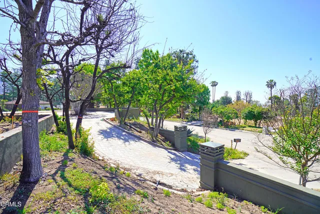 a view of swimming pool with a yard