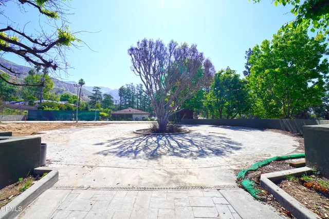 a view of lake with a mountain