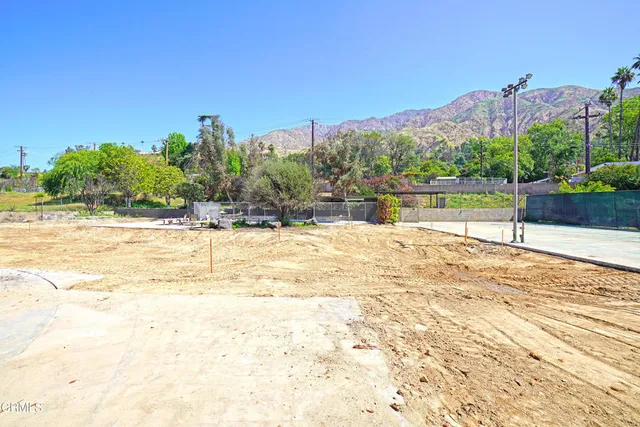 a view of a swimming pool with a balcony