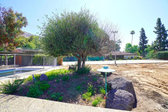 a view of swimming pool with outdoor seating