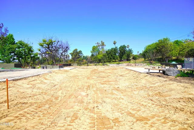 a view of a backyard of a house