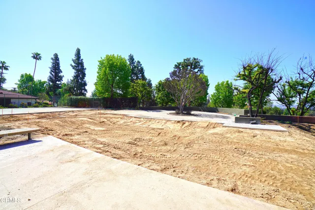 a view of a backyard of a house
