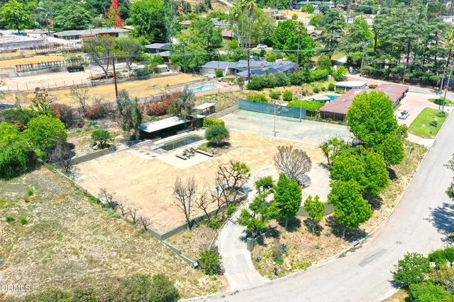 a view of a garden with a patio