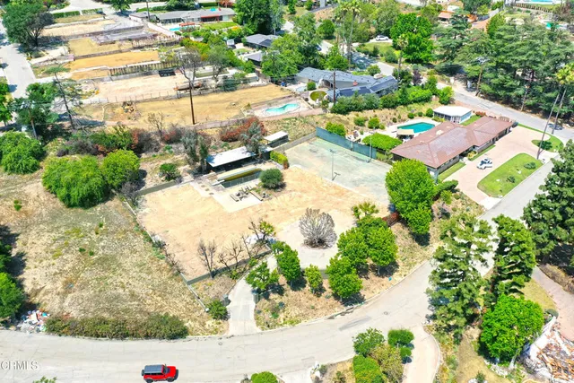 a view of a backyard of a house