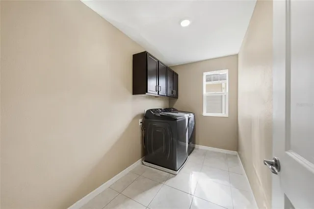 a view of a utility room with washer and dryer