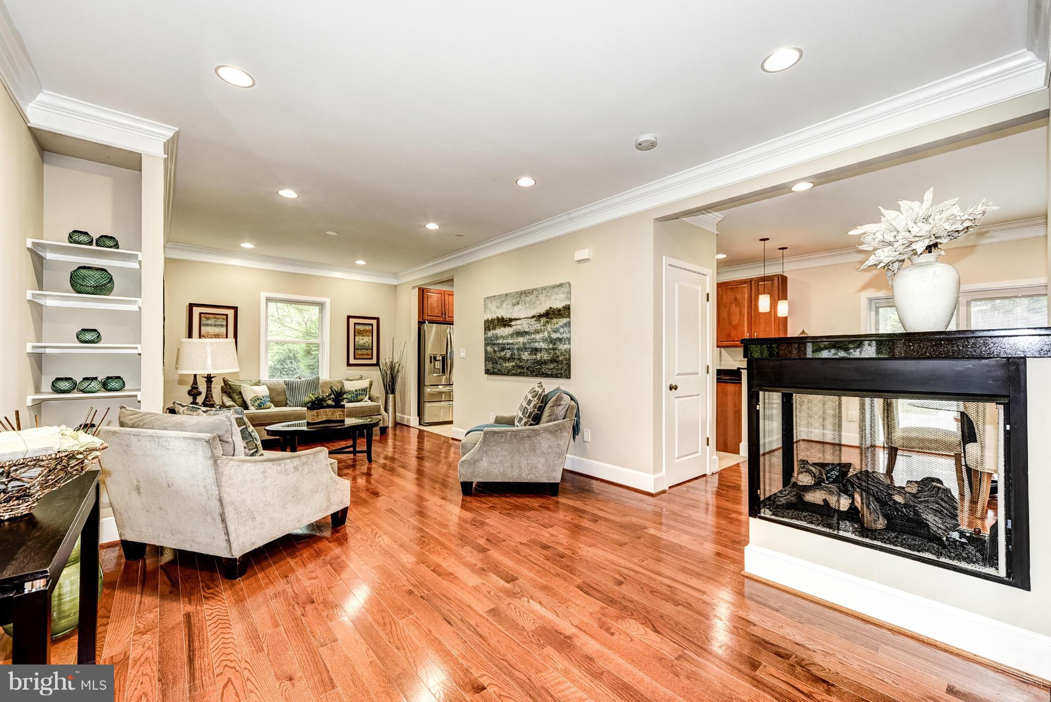 506 Midland Road Silver Spring, MD 20904 - Photo 21 of 28 a living room with furniture and a fireplace