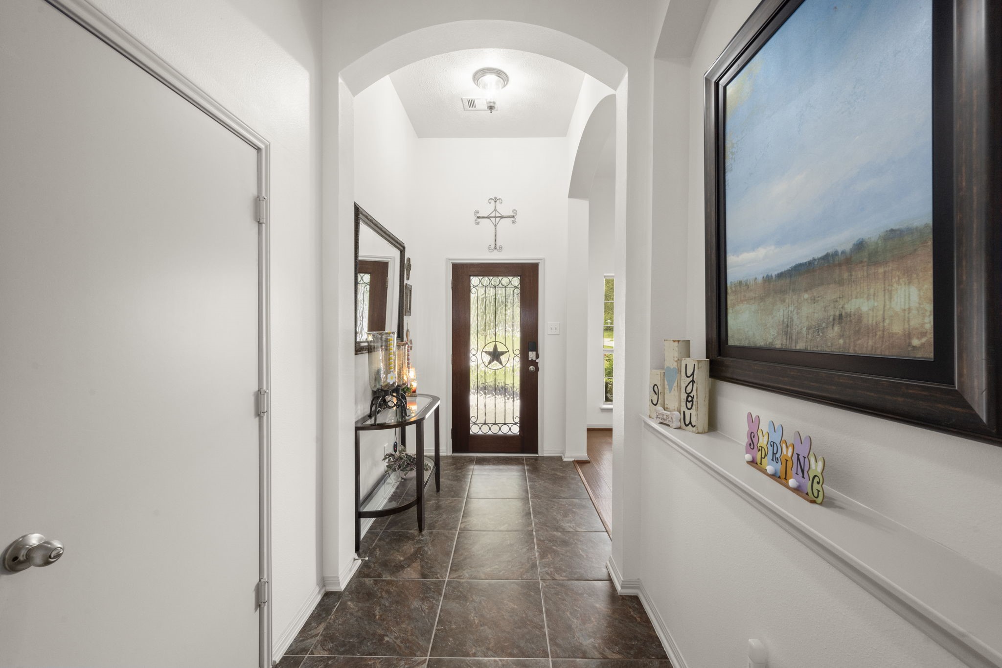 27526 Gatlin Lane Spring, TX 77386 - Photo 14 of 31 Bright and inviting, this tiled entryway creates an elegant, welcoming atmosphere.