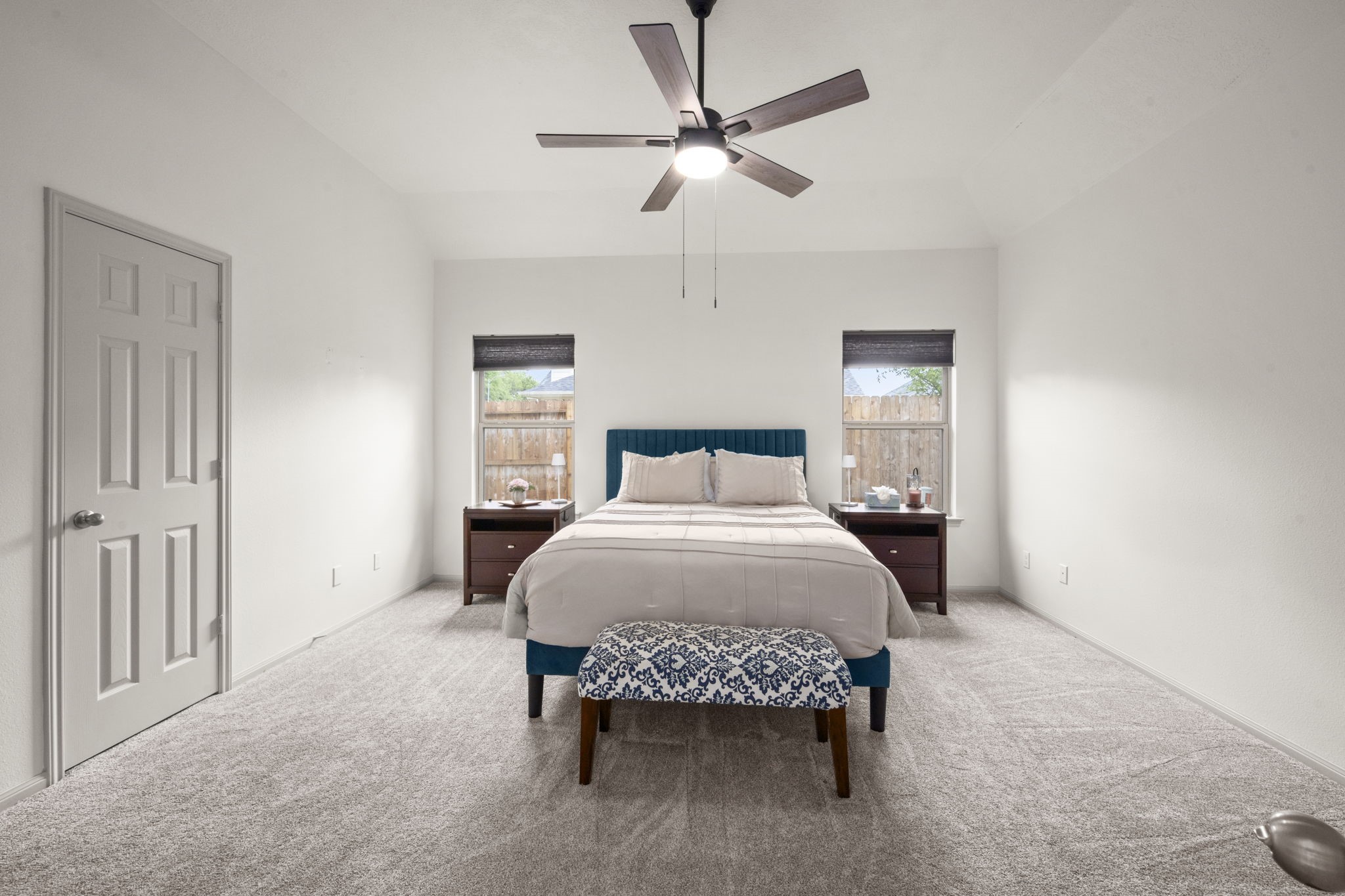 27526 Gatlin Lane Spring, TX 77386 - Photo 23 of 31 Bright and airy primary bedroom offers a spacious yet comfortable retreat.
