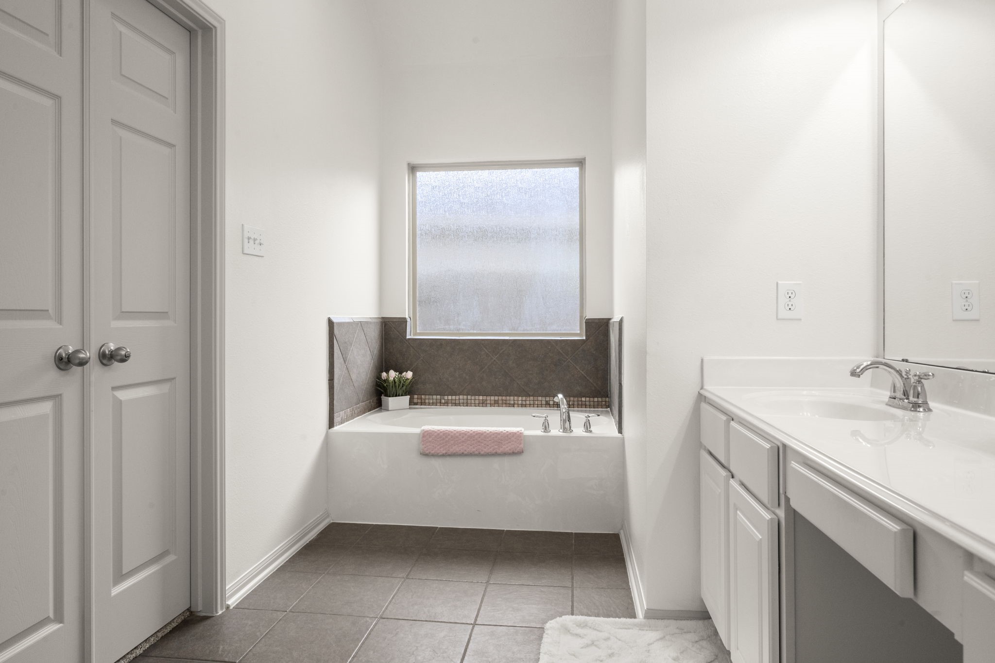 27526 Gatlin Lane Spring, TX 77386 - Photo 25 of 31 Treat yourself to a spa-like escape in this oversized garden tub.