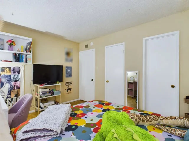 a view of a livingroom with furniture and front door