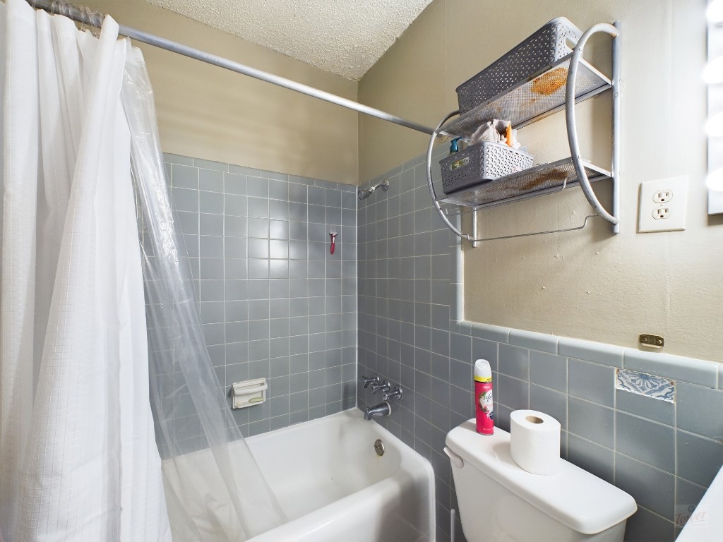 803 West 28th Street, Unit 105 Austin, TX 78705 - Photo 32 of 40 a bathroom with a sink and a shower