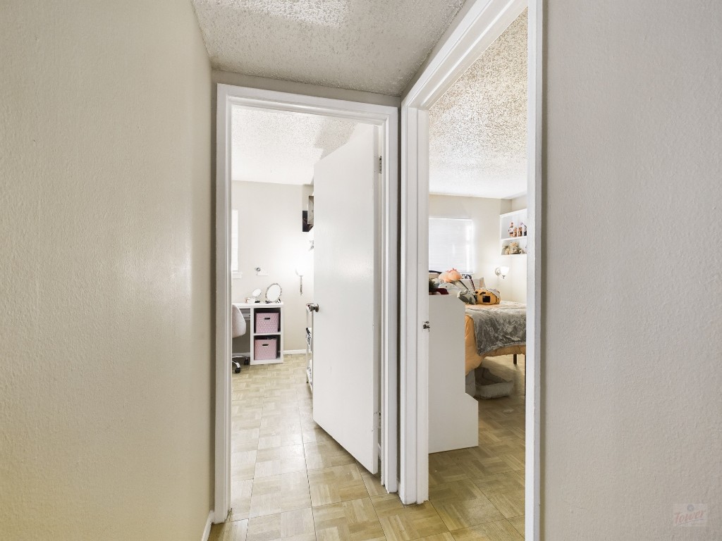 803 West 28th Street, Unit 105 Austin, TX 78705 - Photo 10 of 40 a bathroom with a glass door and a glass door
