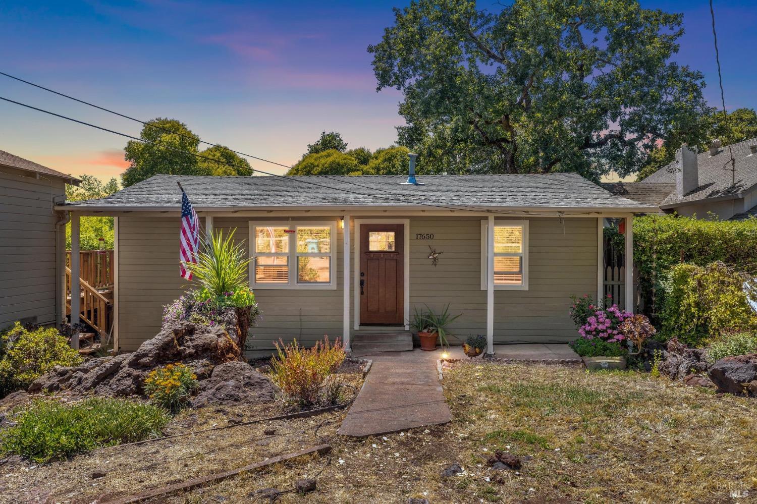 17650 Sunset Way Sonoma, CA 95476 - Photo 1 of 1 a front view of a house with garden