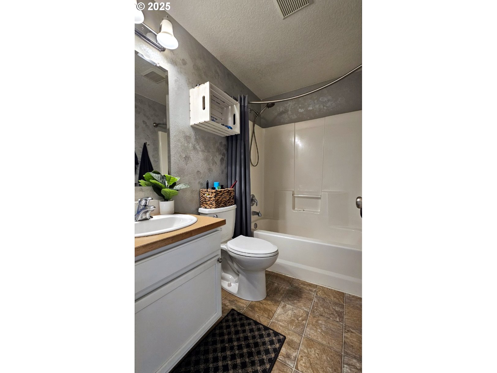 6004 Quartz Avenue Springfield, OR 97478 - Photo 14 of 19 a bathroom with a sink a toilet and shower