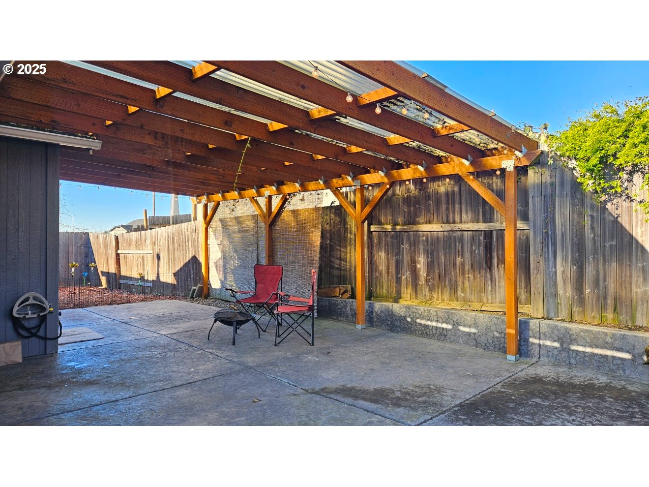 6004 Quartz Avenue Springfield, OR 97478 - Photo 16 of 19 a backyard with table and chairs