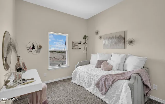 a spacious bathroom with a granite countertop sink a mirror and a