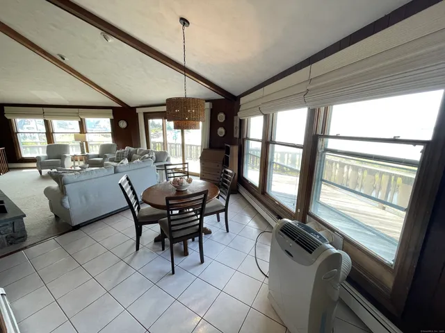 a kitchen with stainless steel appliances a refrigerator a sink a stove and cabinets