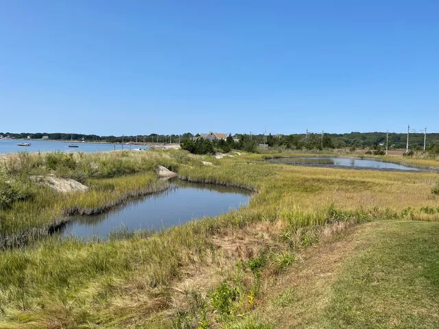 a view of an ocean with city