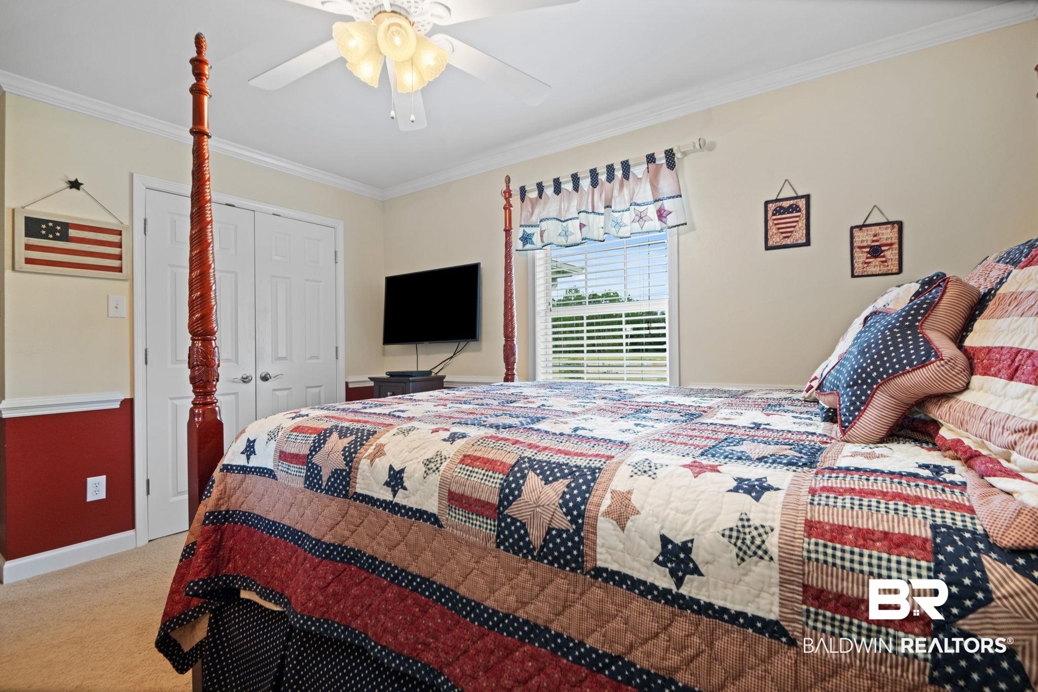 25871 Goat Cooper Road Robertsdale, AL 36567 - Photo 13 of 40 Bedroom with a closet, ceiling fan, carpet, and crown molding