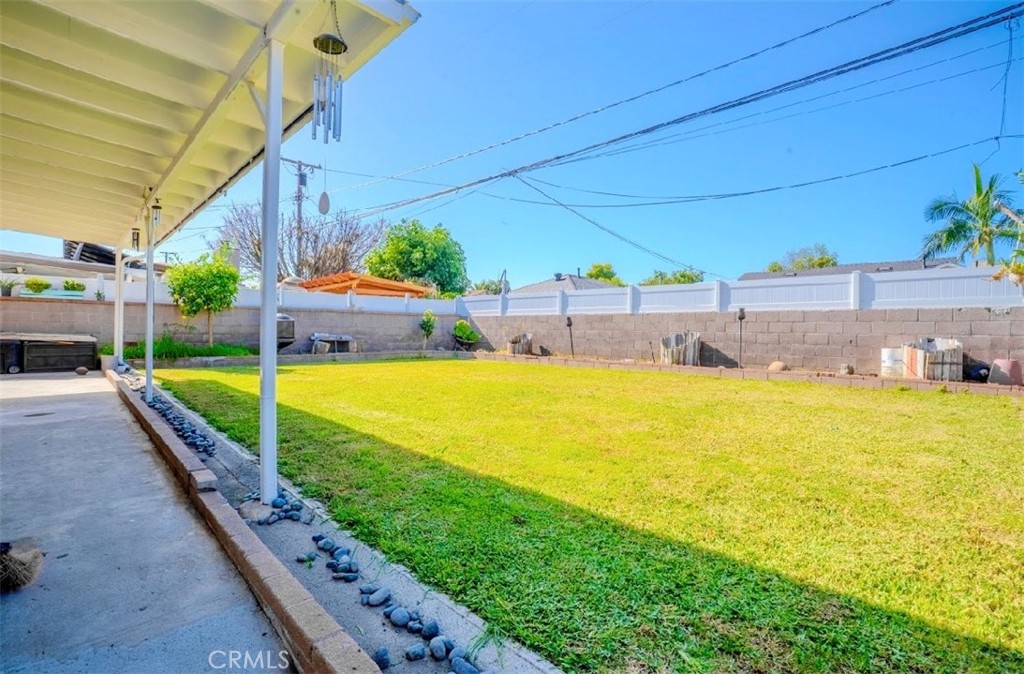 10539 Gridley Road Santa Fe Springs, CA 90670 - Photo 11 of 27 a view of a swimming pool with a patio