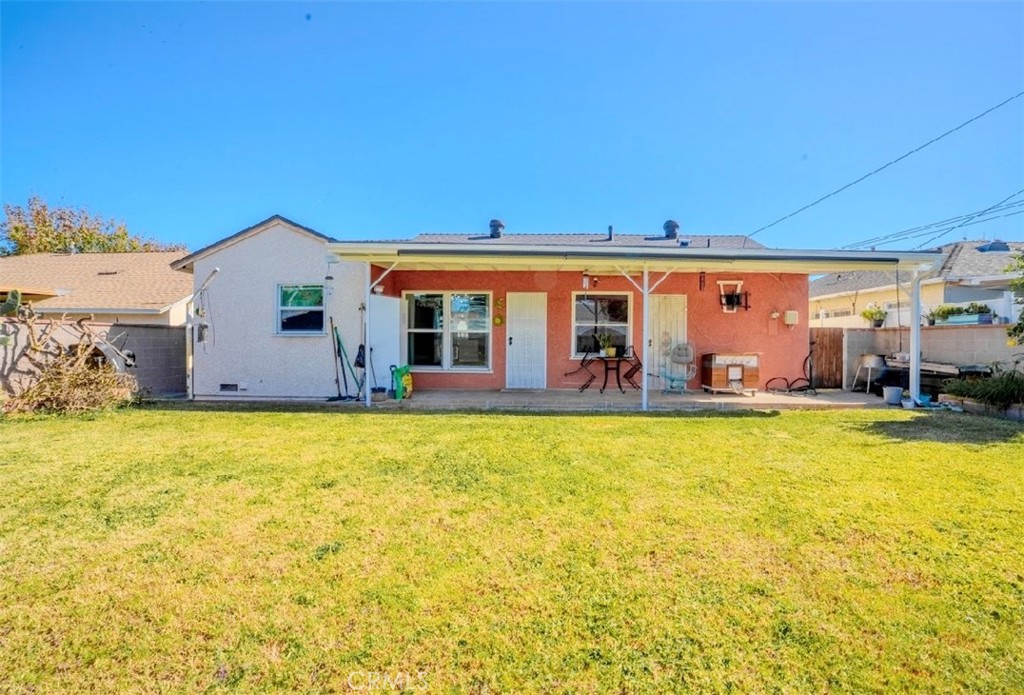 10539 Gridley Road Santa Fe Springs, CA 90670 - Photo 10 of 27 a view of an chairs in front of a house