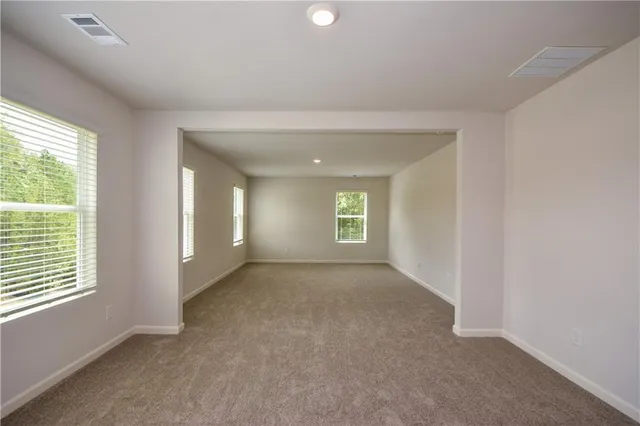 an empty room with windows