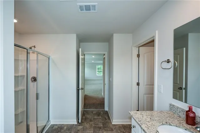 an empty room with closet area