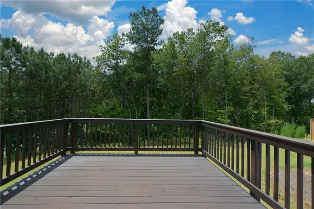 a view of an empty room with a fireplace