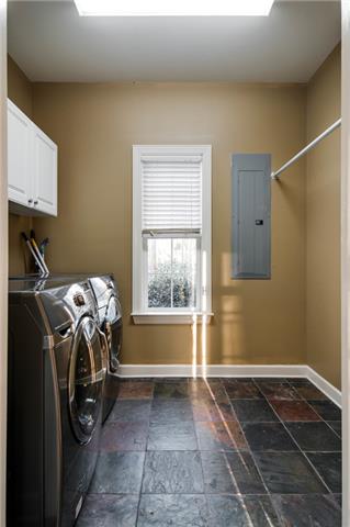 1216 Camp Ravine Road Burns, TN 37029 - Photo 18 of 20 a utility room with a washer and dryer